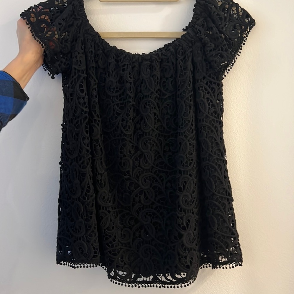 Black lace, cap sleeve top XS with swirl detail edging detail as well